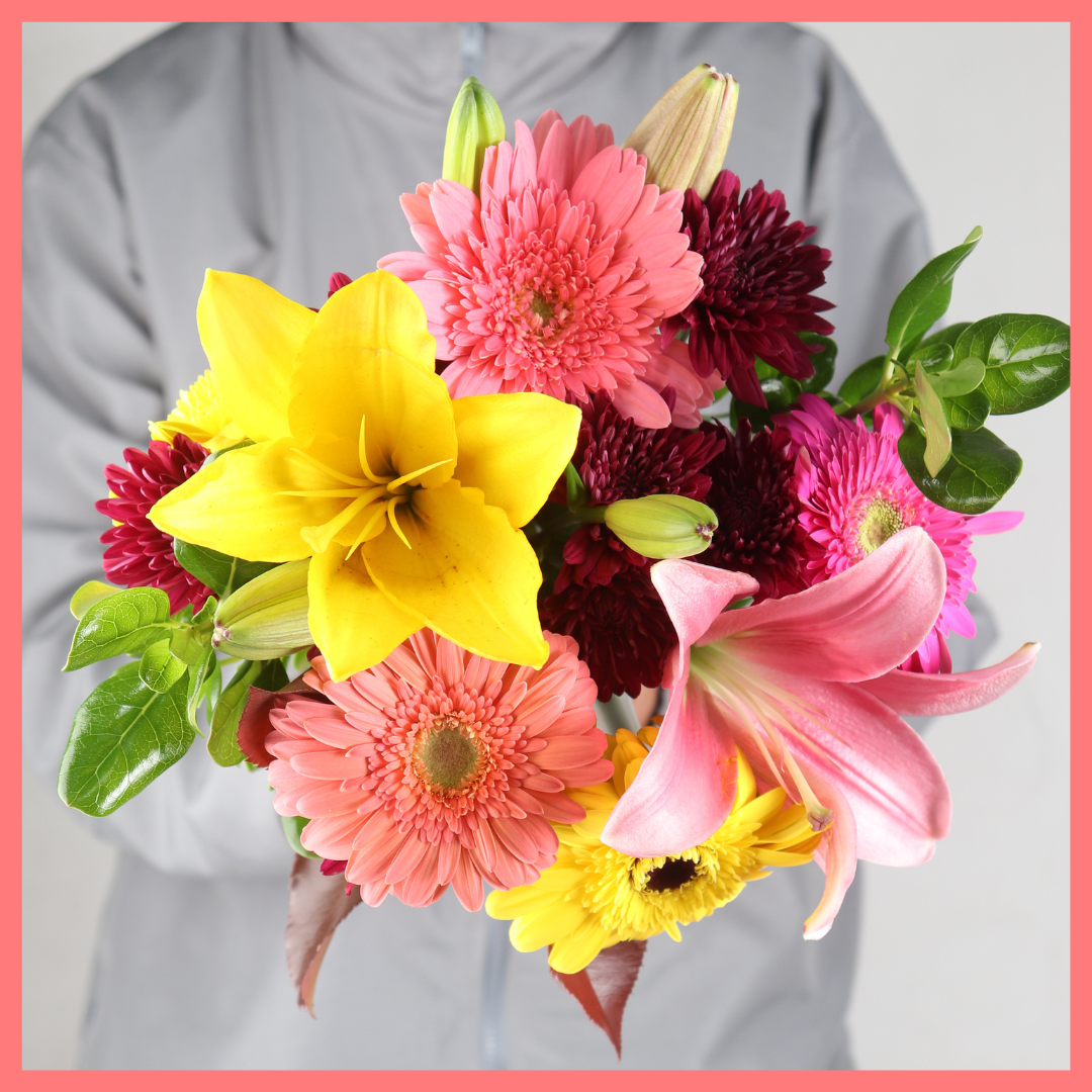 The Color Bomb bouquet includes mixed stems of gerbera daisies, dianthus, lilies, statice, and pittosporum! Please note that as flowers are a live product, colors, and varieties may slightly vary from the photos shown to provide you with the freshest and most beautiful bouquet.