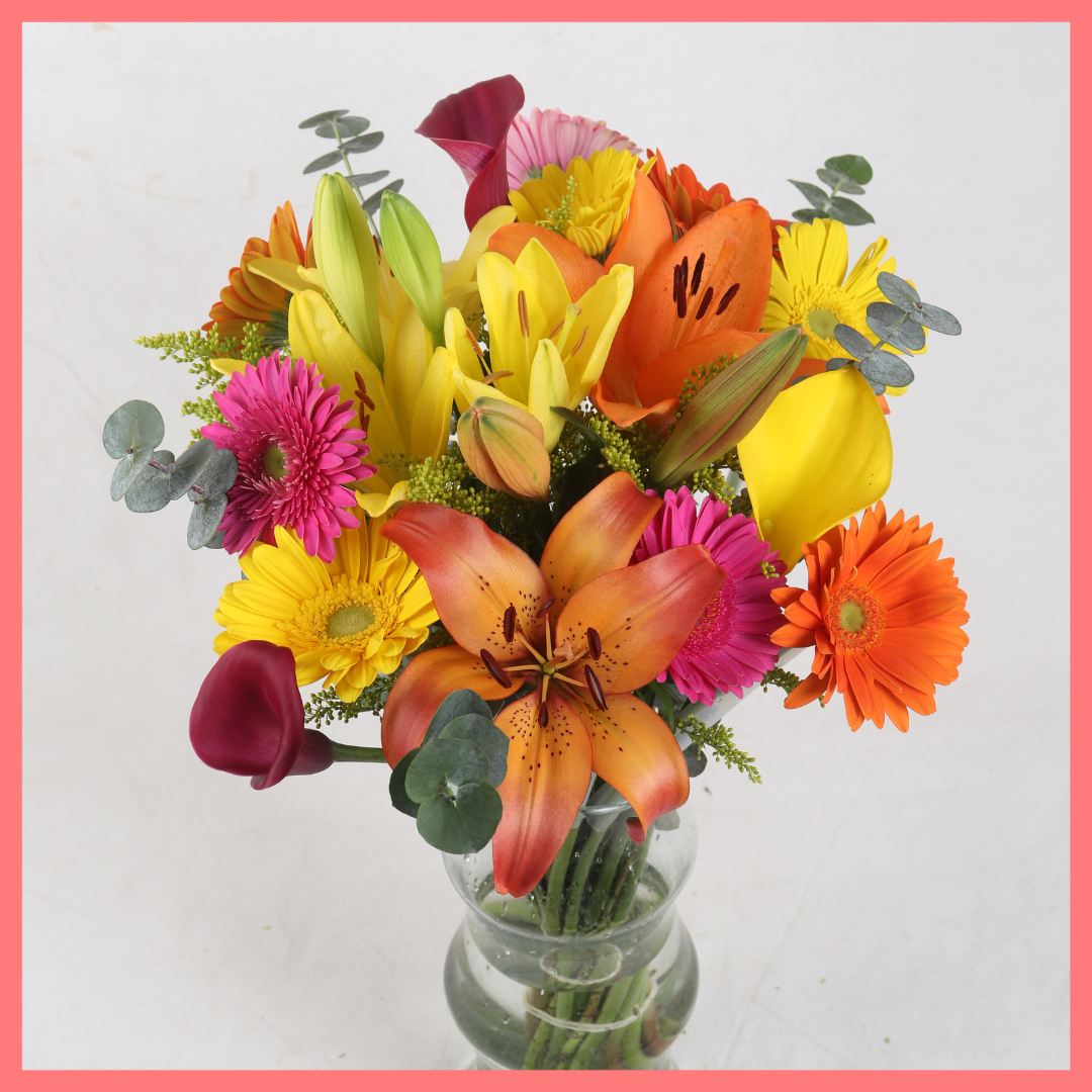 The Fall Breeze bouquet includes mixed stems of eucalyptus, lilies, gerbera daisies, mini calla lilies, and aster! Please note that as flowers are a live product, colors, and varieties may slightly vary from the photos shown to provide you with the freshest and most beautiful bouquet.