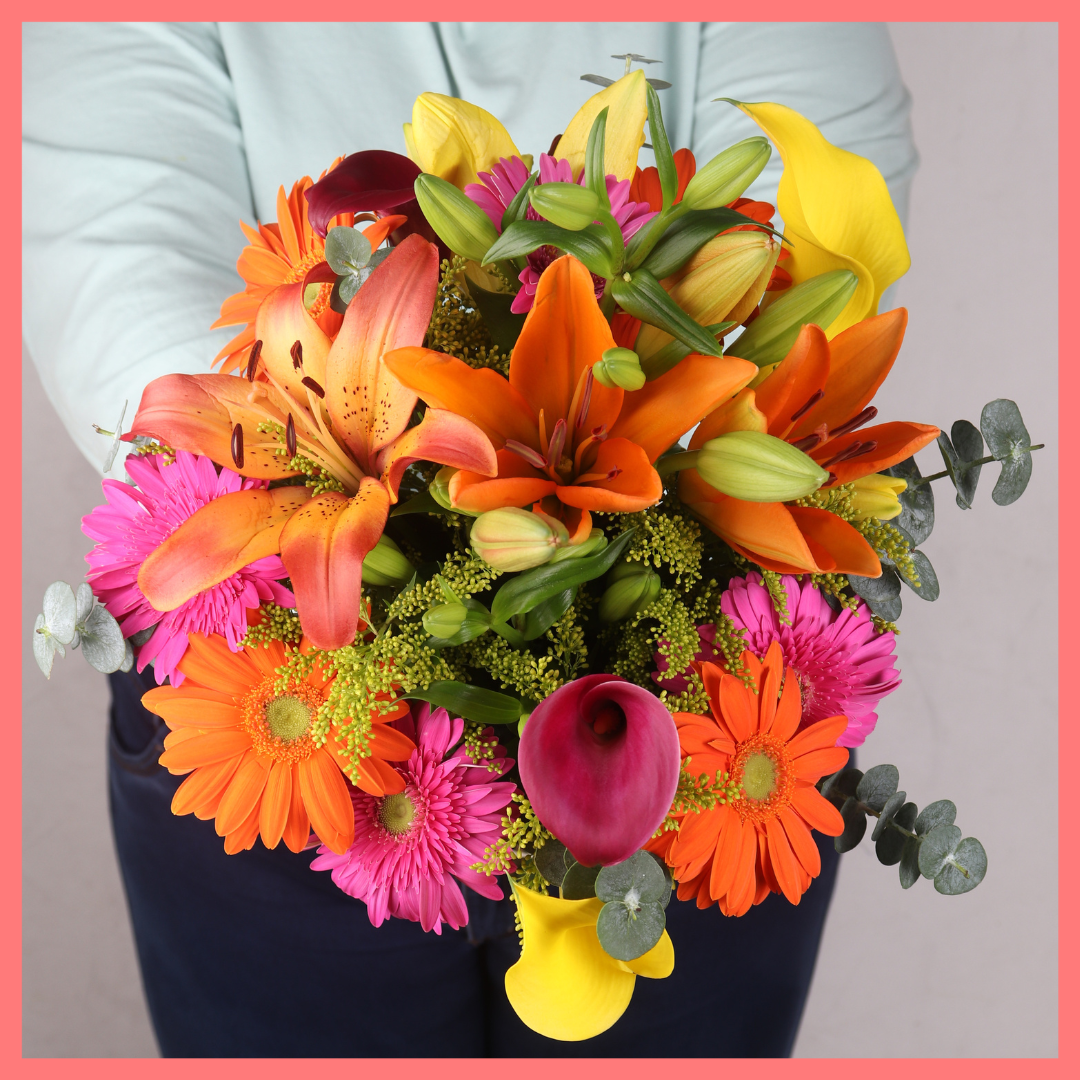 The Fall Breeze bouquet includes mixed stems of eucalyptus, lilies, gerbera daisies, mini calla lilies, and aster! Please note that as flowers are a live product, colors, and varieties may slightly vary from the photos shown to provide you with the freshest and most beautiful bouquet.