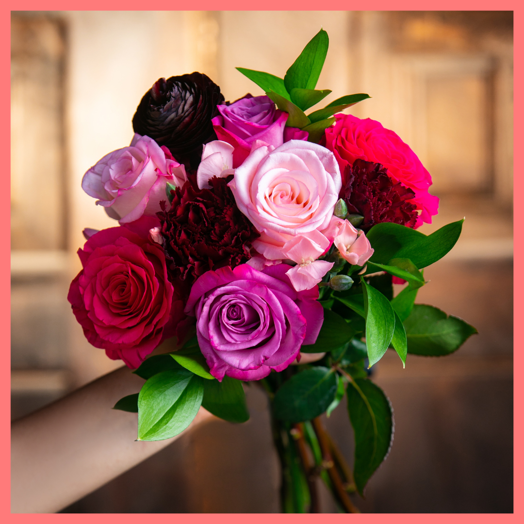 The Her Majesty bouquet includes mixed stems of roses, dianthus, carnations, ranunculus, and ruscus. Please note that as flowers are a live product, colors and varieties may slightly vary from the photos shown to provide you with the freshest and most beautiful bouquet.