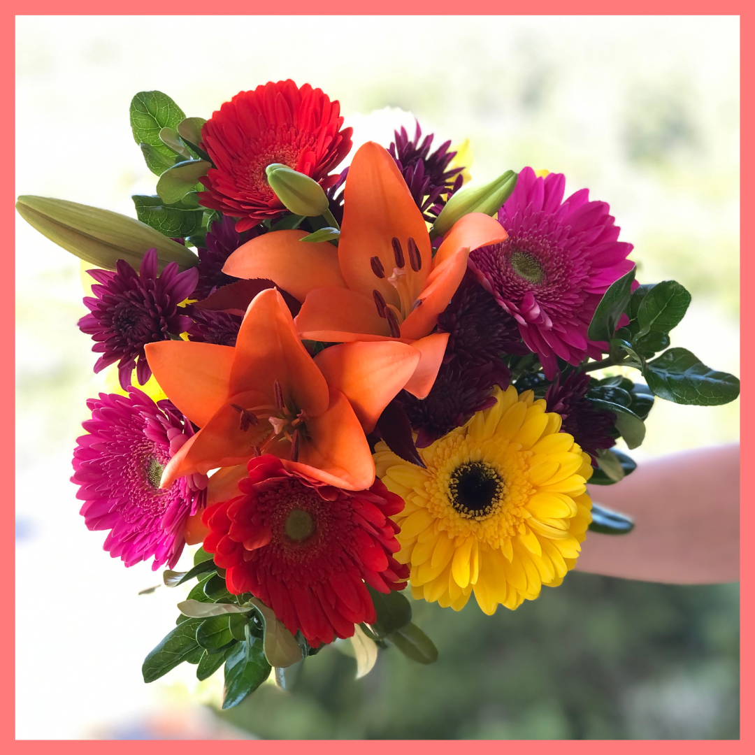  The Rainbow Snowcone bouquet includes mixed stems of lilies, gerbera daisies, CDN pompoms, photinia, and brillantina!