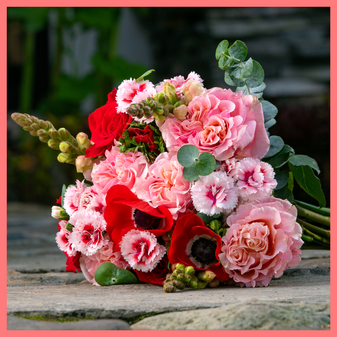 The VDAY Szn bouquet includes mixed stems of roses, snapdragon, solomio, anemone, and eucalyptus. Please note that as flowers are a live product, colors and varieties may slightly vary from the photos shown to provide you with the freshest and most beautiful bouquet.