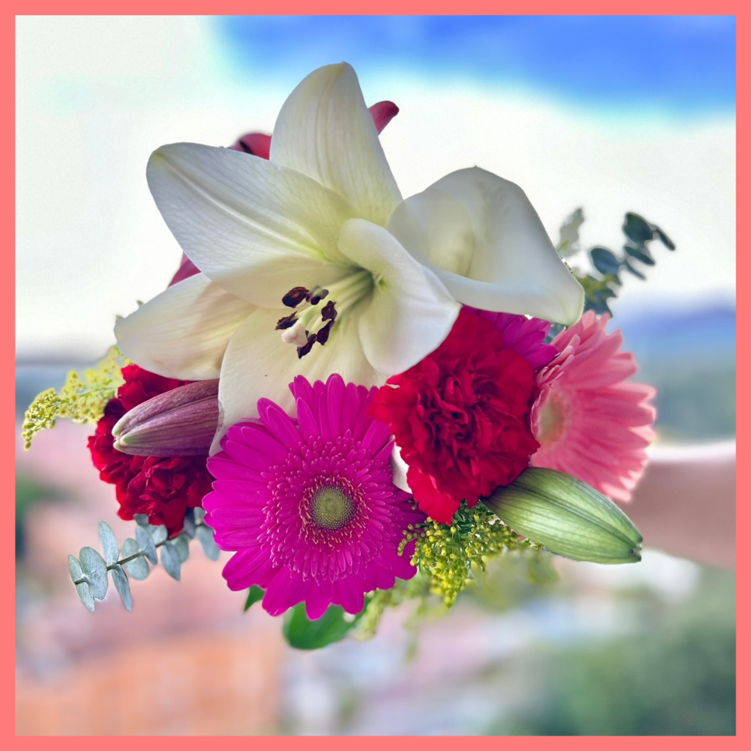 The Xmas Breeze bouquet includes mixed stems of lilies, gerbera daisies, mini callas, carnations, aster, and eucalyptus! Please note that as flowers are a live product, colors, and varieties may slightly vary from the photos shown to provide you with the freshest and most beautiful bouquet.