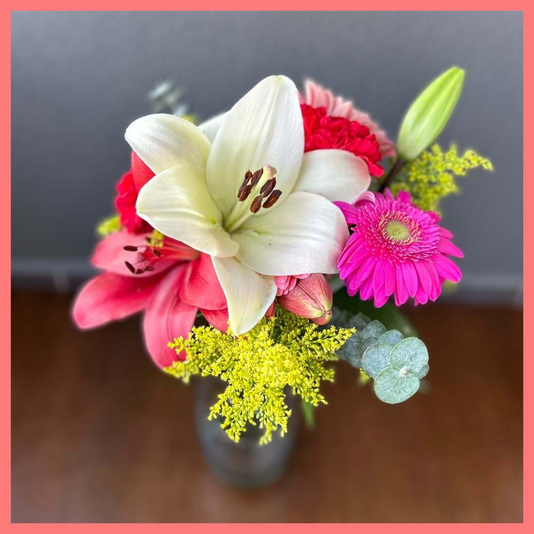 The Xmas Breeze bouquet includes mixed stems of lilies, gerbera daisies, mini callas, carnations, aster, and eucalyptus! Please note that as flowers are a live product, colors, and varieties may slightly vary from the photos shown to provide you with the freshest and most beautiful bouquet.