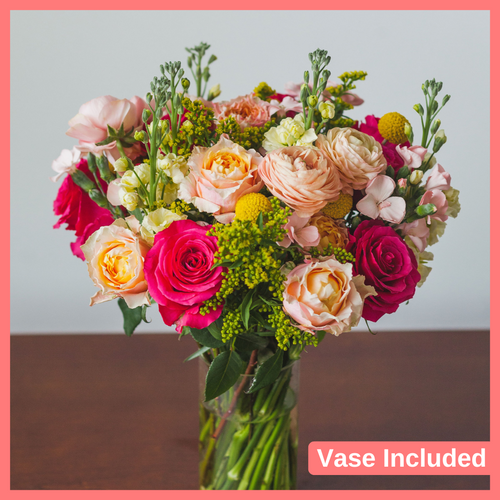 Order the My Dear flower bouquet. The My Dear bouquet includes mixed stems of ranunculus, roses, solidago, snapdragons, solomio, and craspedia. Vase included. The flowers will be shipped directly from the farm to you!