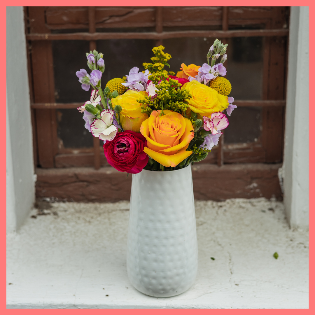 Order the Celebrate Good Times flower bouquet! The Celebrate Good Times bouquet includes mixed stems of craspedia, ranunculus, stock, roses, solomio, and solidago. The flowers will be shipped directly from the farm to you!