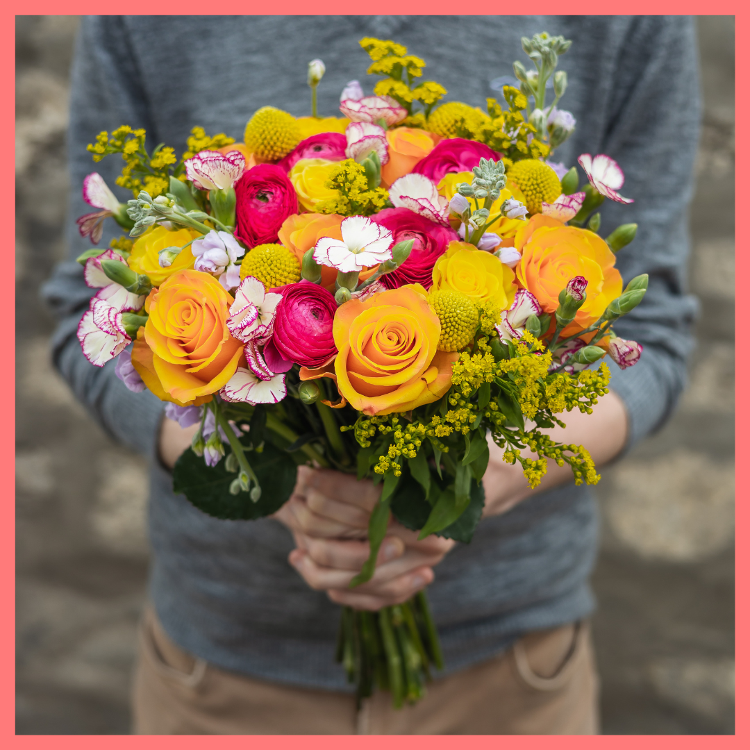 Order the Celebrate Good Times flower bouquet! The Celebrate Good Times bouquet includes mixed stems of craspedia, ranunculus, stock, roses, solomio, and solidago. The flowers will be shipped directly from the farm to you!
