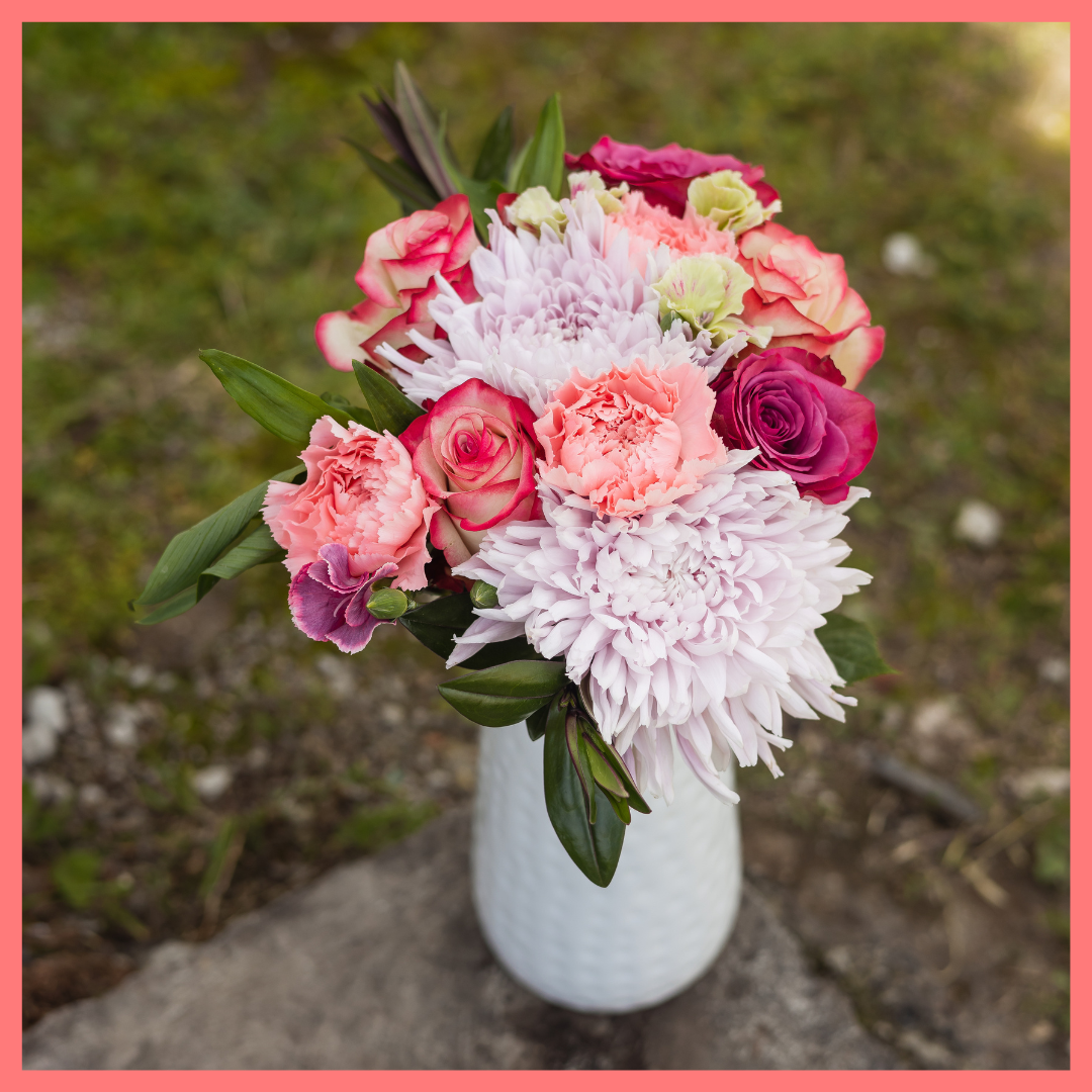 The Moment in Time bouquet includes mixed stems of roses, chrysanthemums, carnations, solomio, alstroemeria, limonium, and hebes. Limonium only included in Lux and Premier sizes. Please note that as flowers are a live product, colors and varieties may slightly vary from the photos shown to provide you with the freshest and most beautiful bouquet.