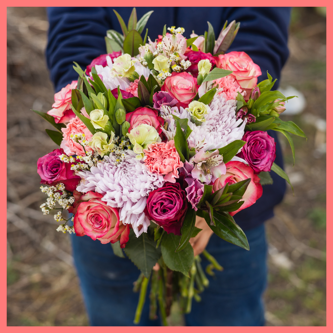 The Moment in Time bouquet includes mixed stems of roses, chrysanthemums, carnations, solomio, alstroemeria, limonium, and hebes. Limonium only included in Lux and Premier sizes. Please note that as flowers are a live product, colors and varieties may slightly vary from the photos shown to provide you with the freshest and most beautiful bouquet.