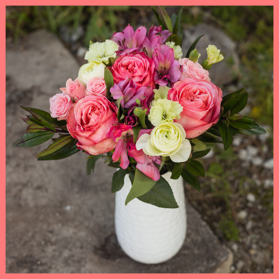 Order the Thinking of You flower bouquet! The Thinking of You bouquet includes mixed stems of roses, spray roses, solomio, alstroemeria, and ranunculus. The flowers will be shipped directly from the farm to you!