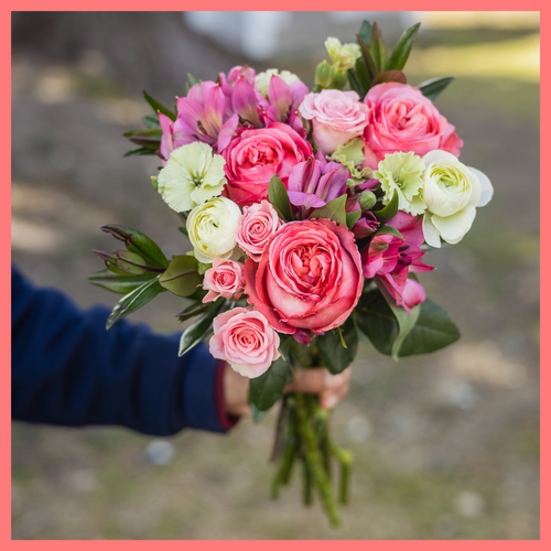 Order the Thinking of You flower bouquet! The Thinking of You bouquet includes mixed stems of roses, spray roses, solomio, alstroemeria, and ranunculus. The flowers will be shipped directly from the farm to you!